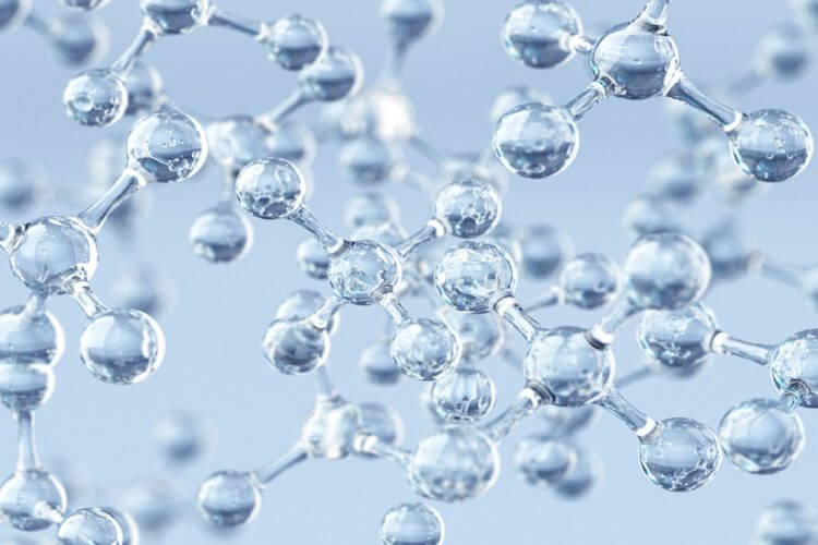 A close-up illustration of transparent molecules connected by bonds, representing a molecular structure on a light blue background.
